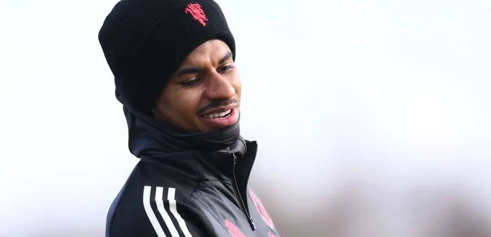 Player wearing black beanie during training session