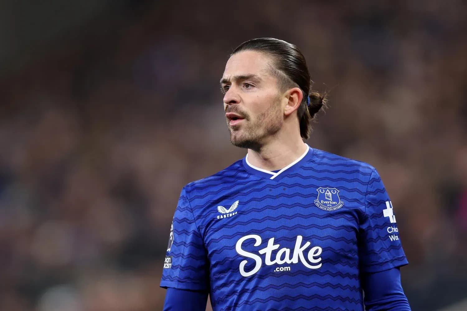 Player in blue Everton jersey during match