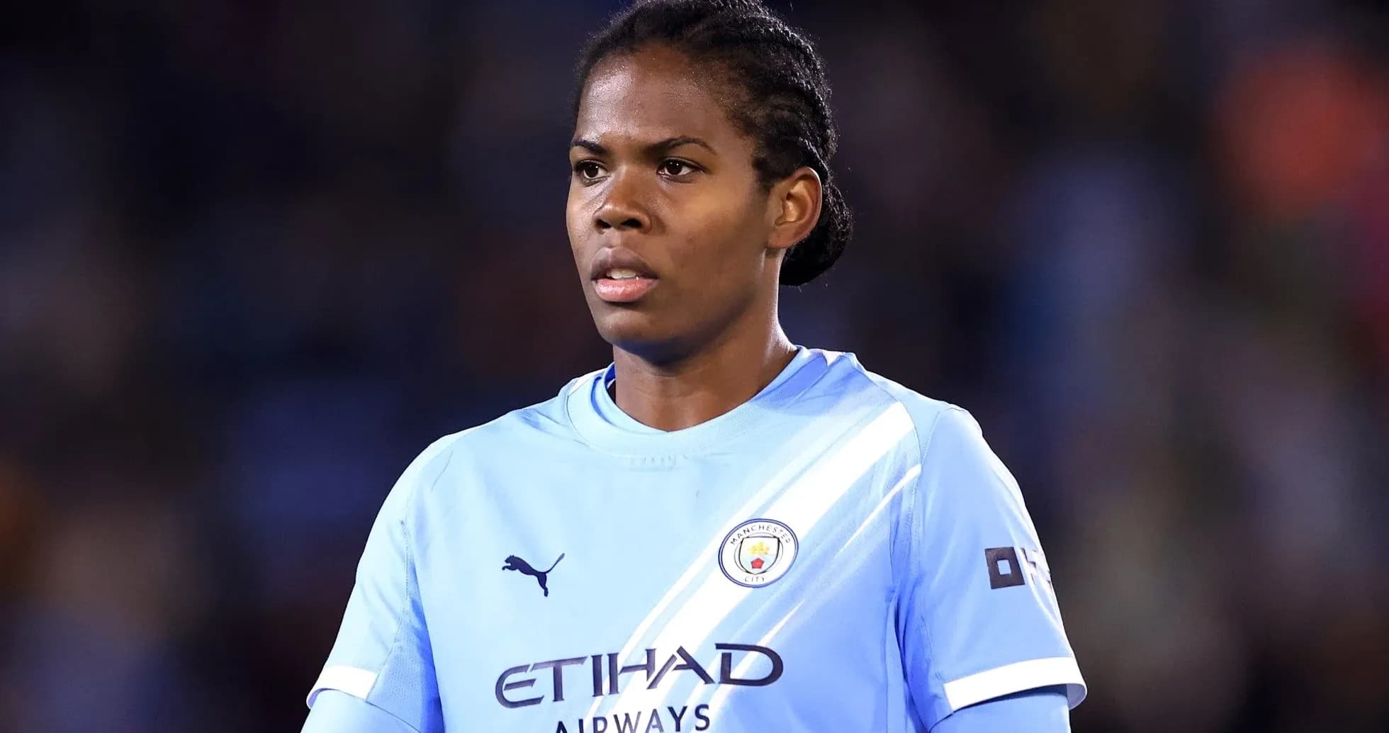 Player wearing Manchester City jersey during match