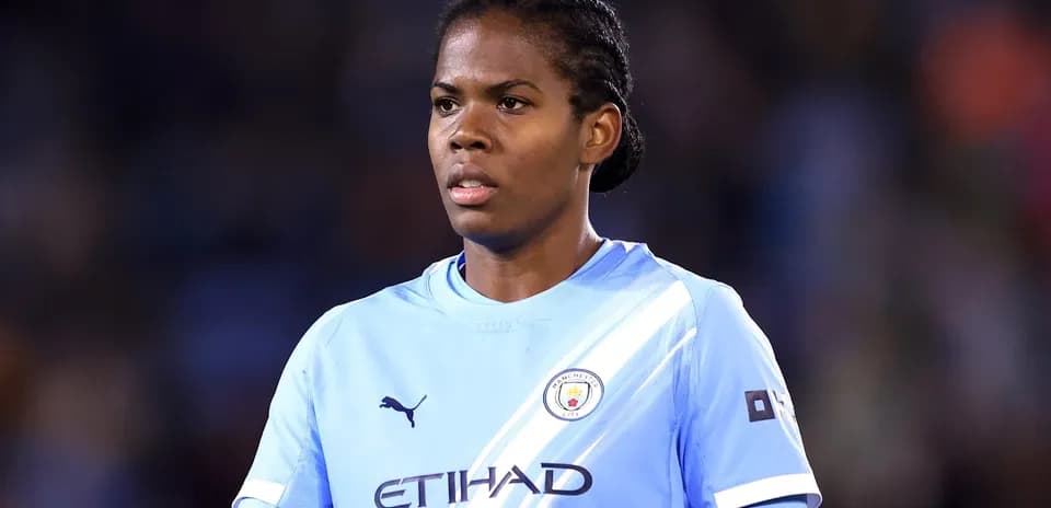 Player wearing Manchester City jersey during match