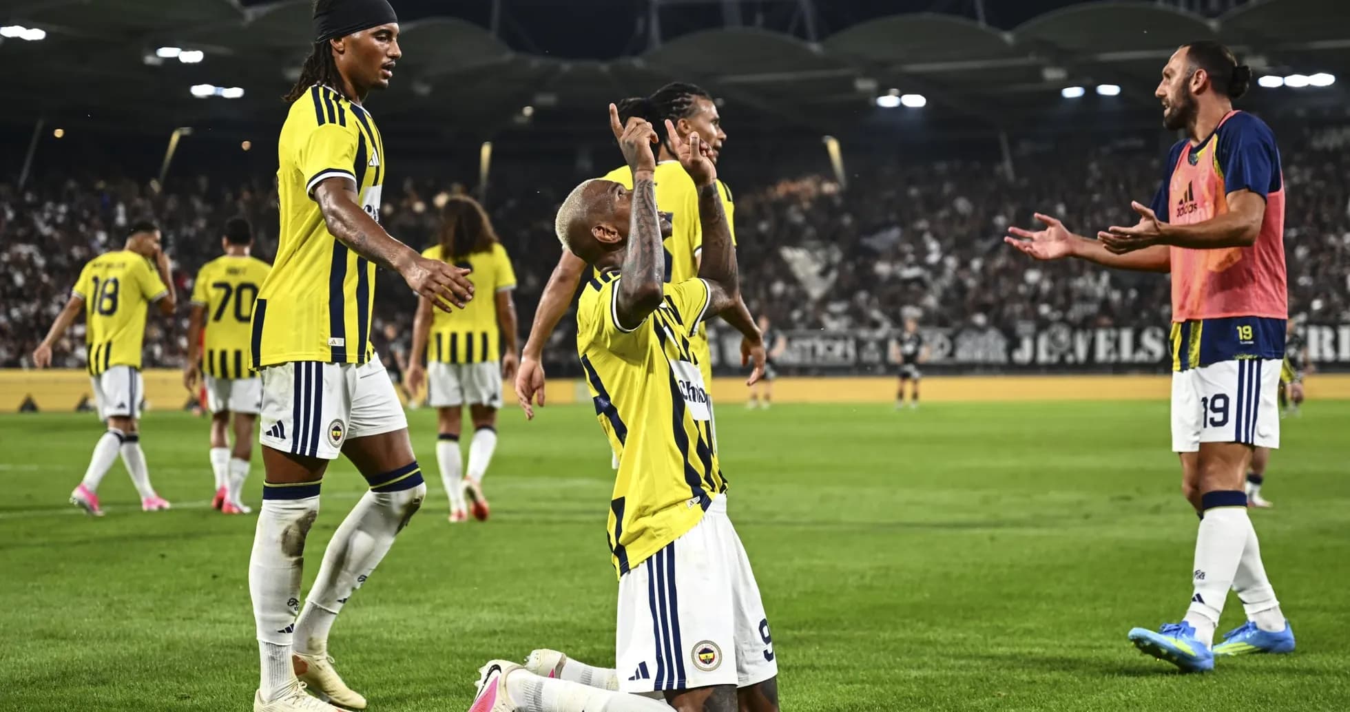 Fenerbahçe players celebrating during UEFA match