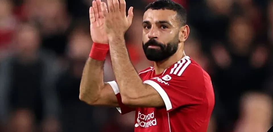 Player applauding fans after the match