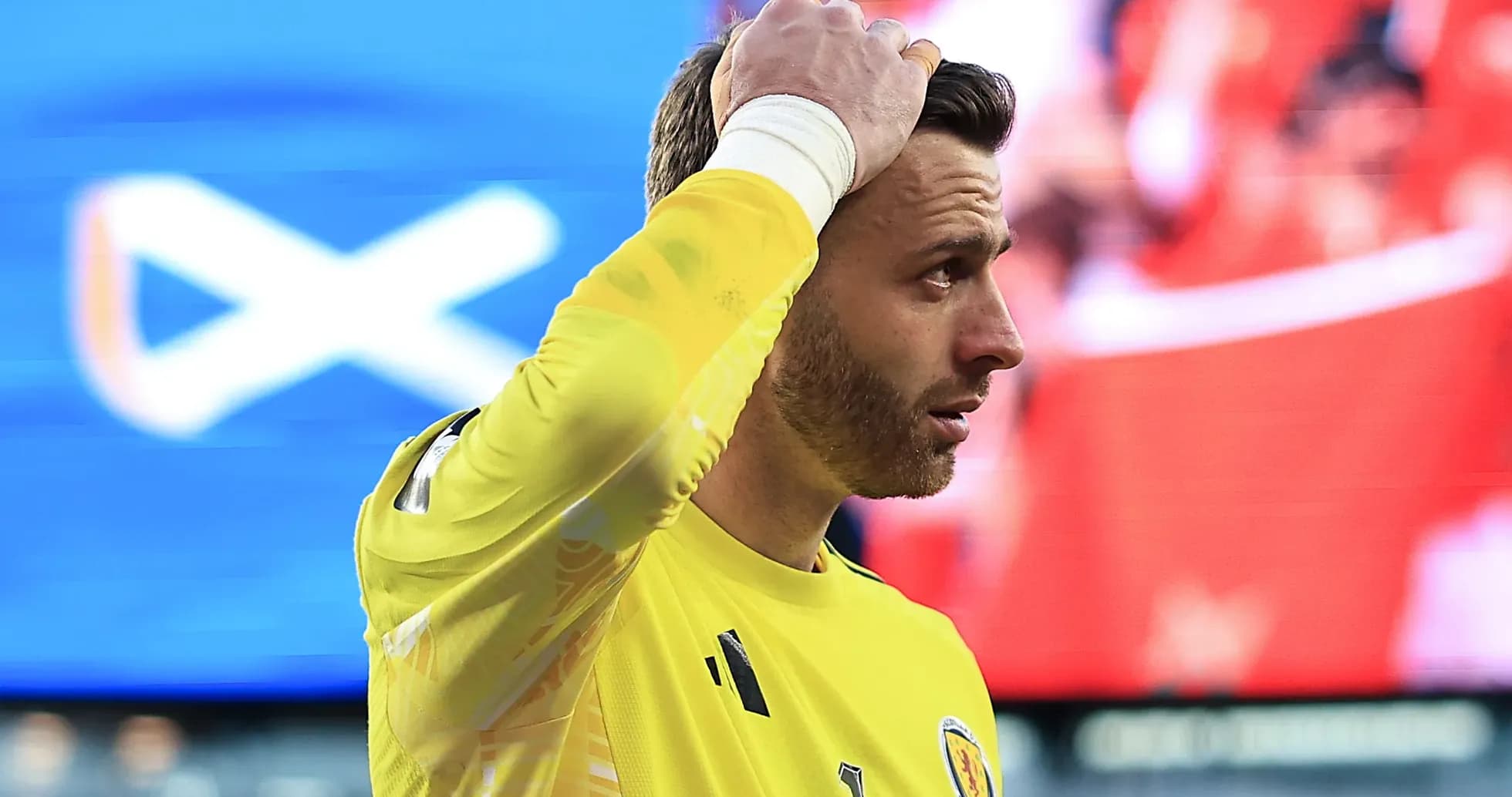 Goalkeeper in yellow jersey during a match