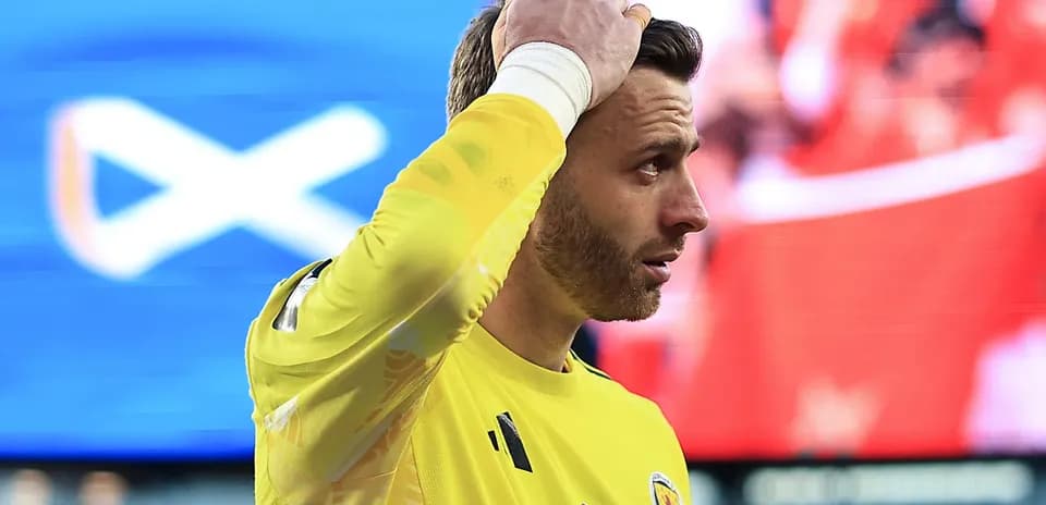 Goalkeeper in yellow jersey during a match