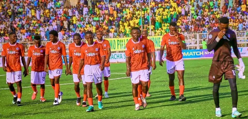 Ikorodu City players walking off the pitch
