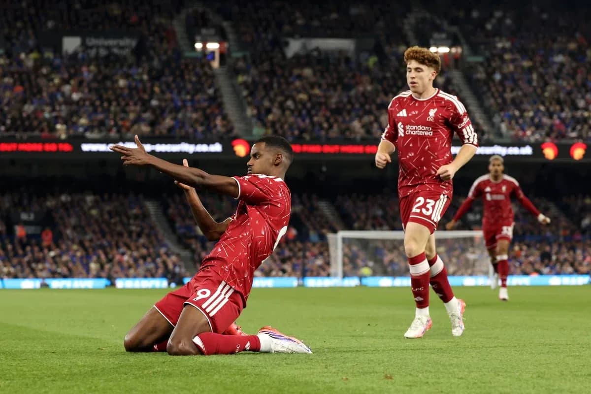 Liverpool players celebrating a goal on the field
