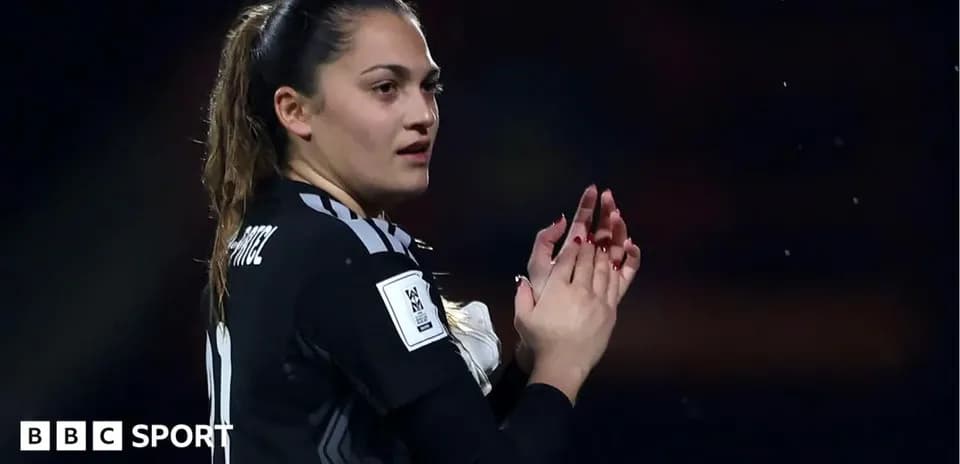 Goalkeeper clapping during a match