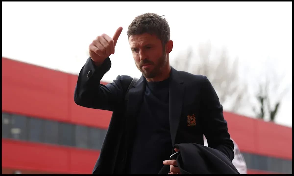 Man giving a thumbs up while entering stadium