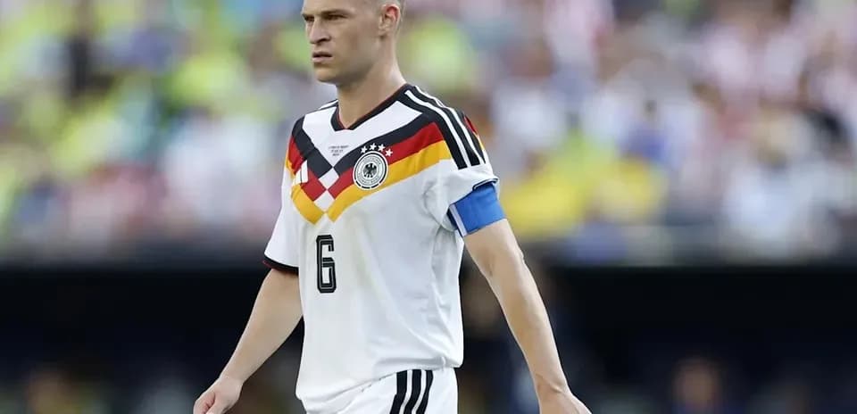 Player wearing Germany kit walking on the field