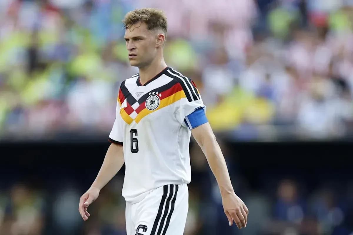 Player wearing Germany kit walking on the field