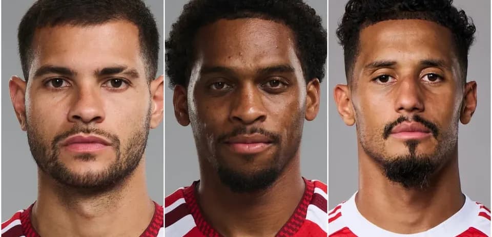 Three soccer players posing for headshots in jerseys