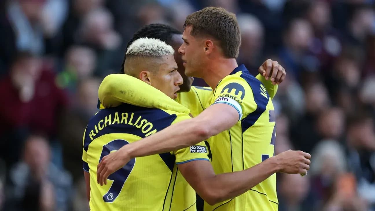 Richarlison celebrating with teammates after a goal