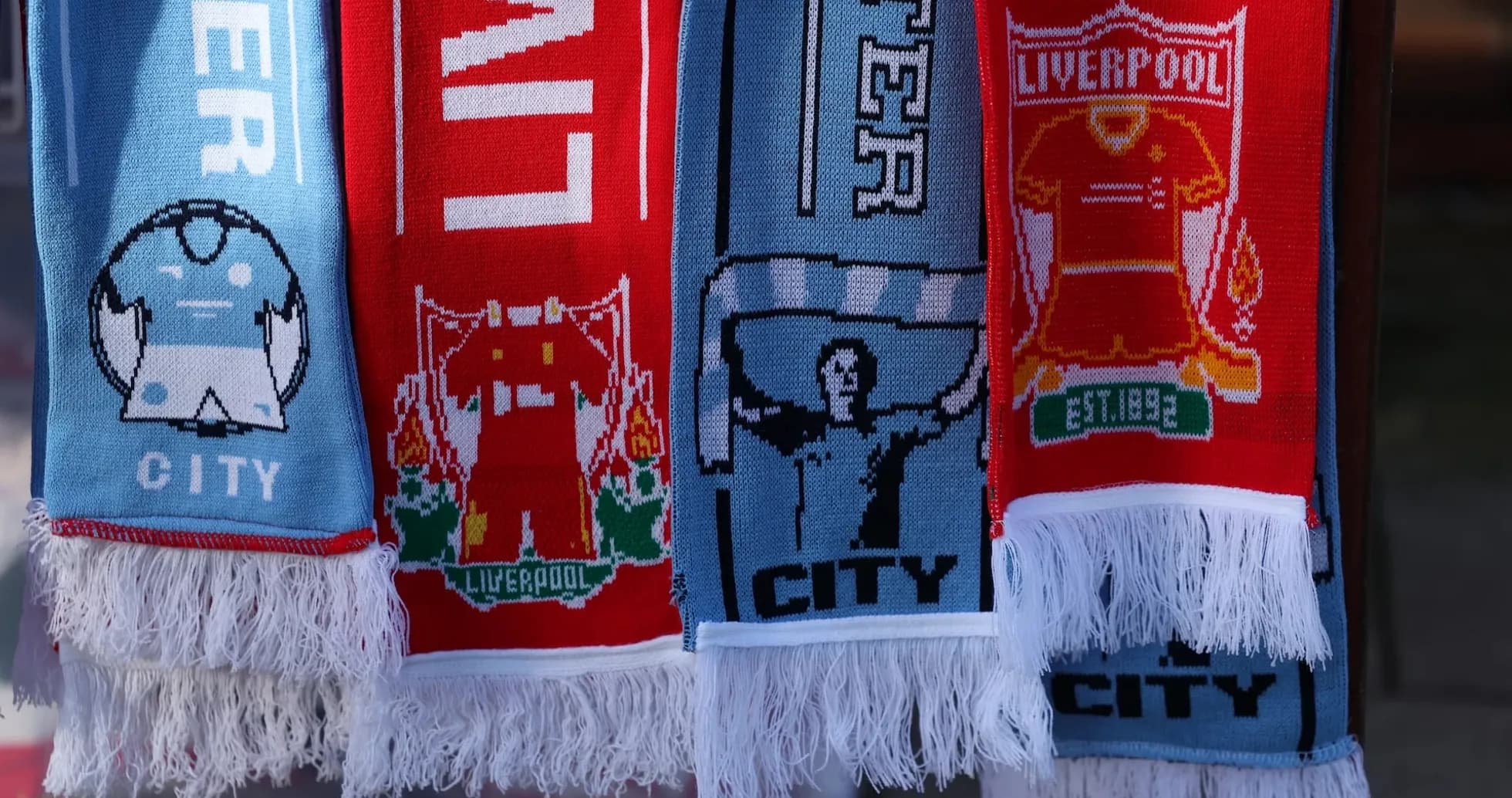 Scarves representing Liverpool and Manchester City