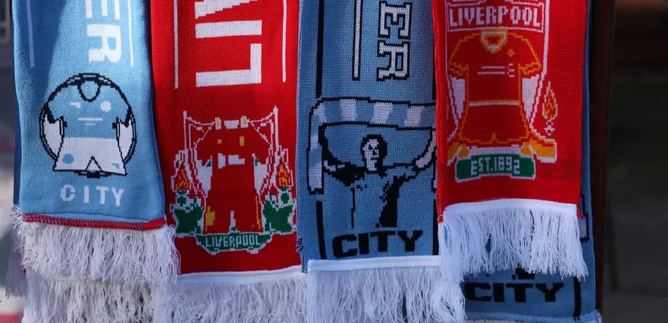 Scarves representing Liverpool and Manchester City