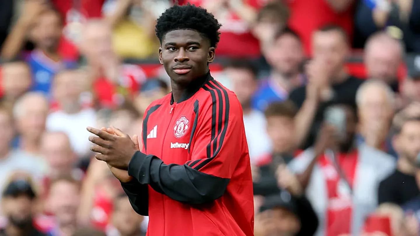 Player in Manchester United kit during warm-up