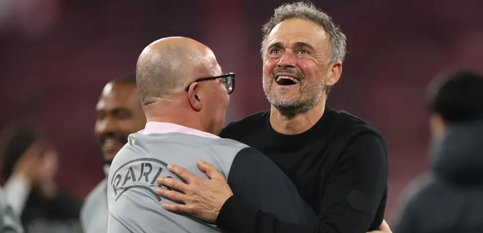 Coaches celebrating together after a match
