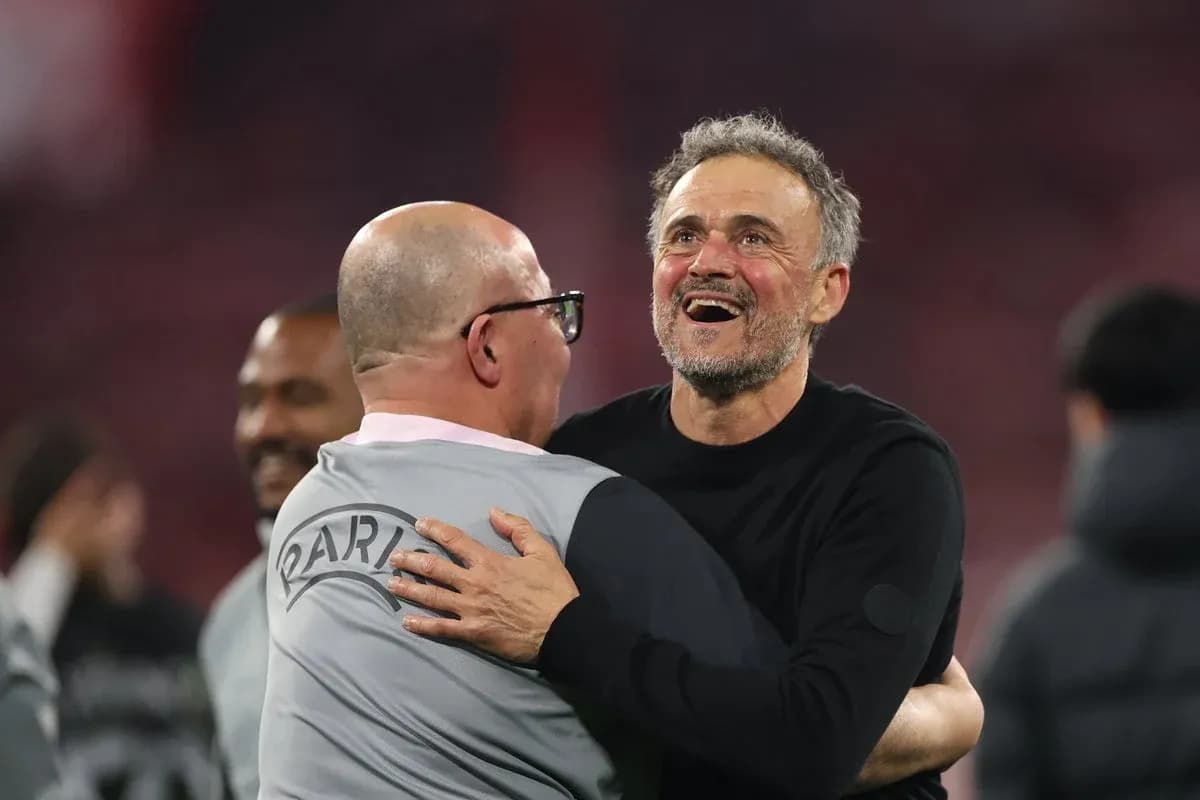 Coaches celebrating together after a match
