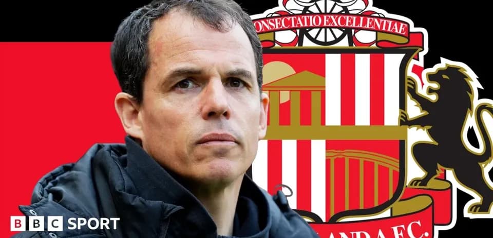 Coach in front of Sunderland A.F.C. logo