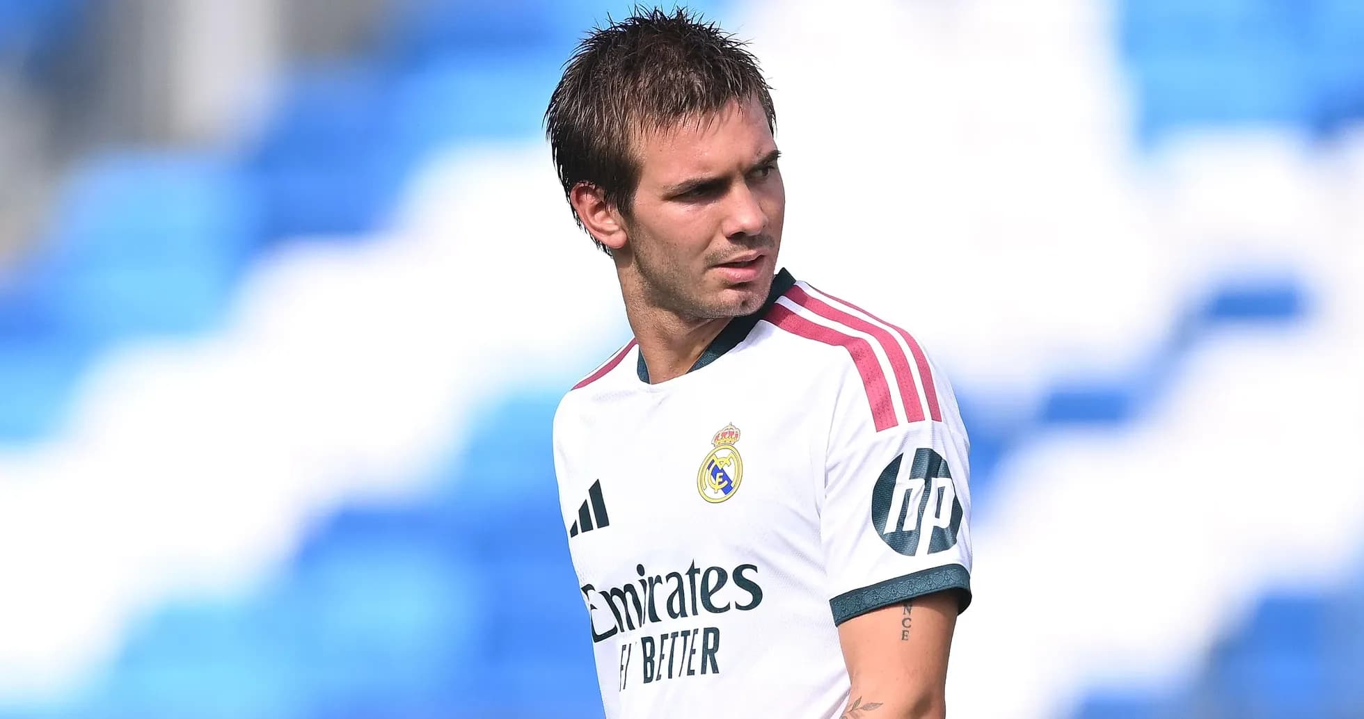 Player in Real Madrid jersey on training pitch