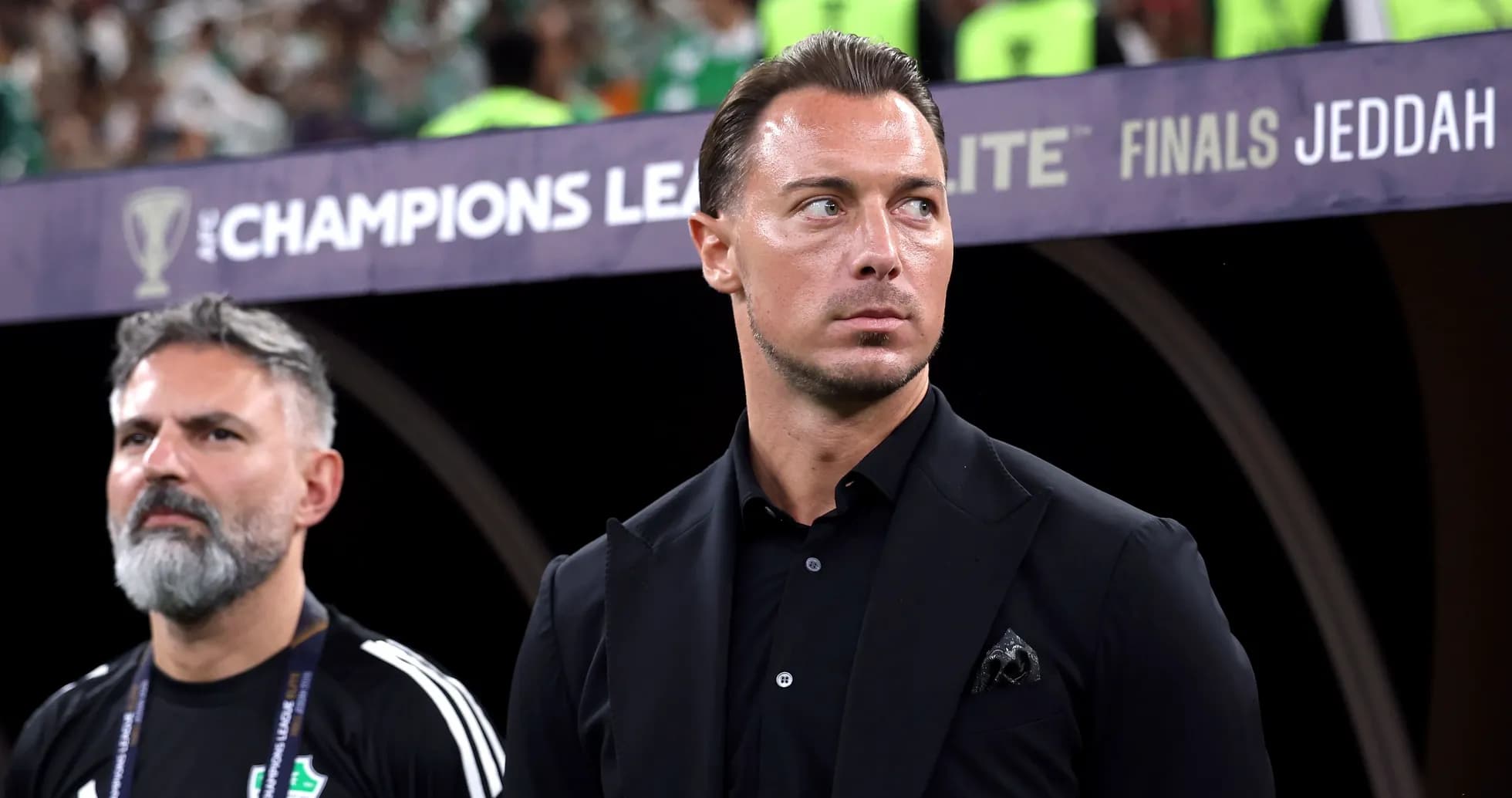 Two coaches observing match during AFC Champions League final