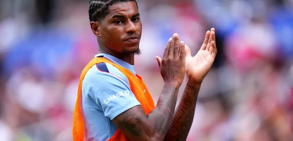 Player applauding during match warm-up on field