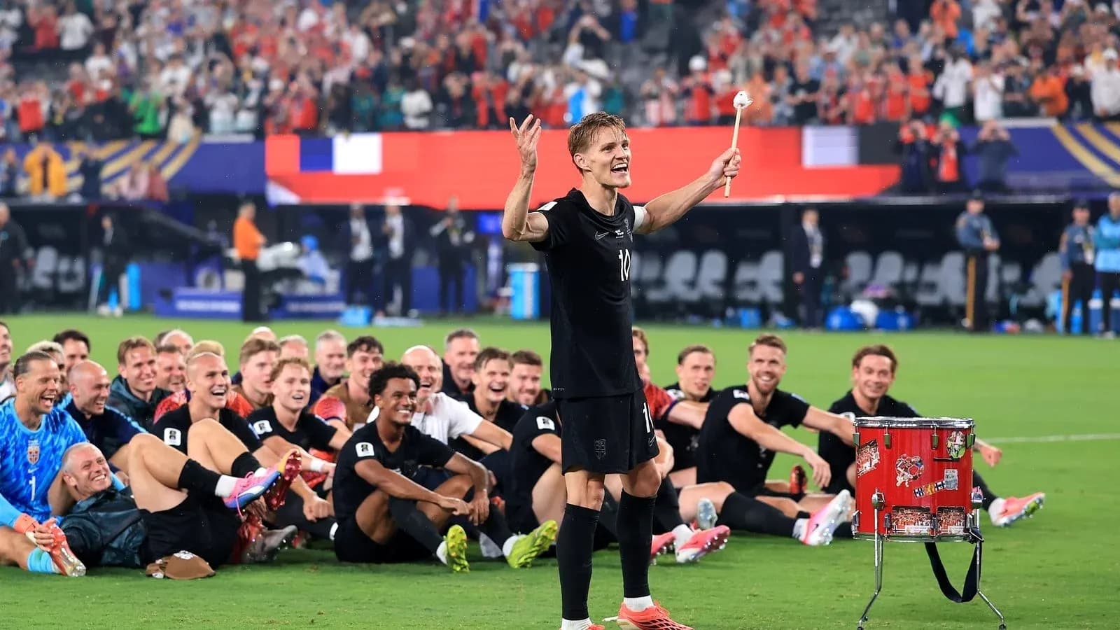 Player celebrating with teammates after a victory