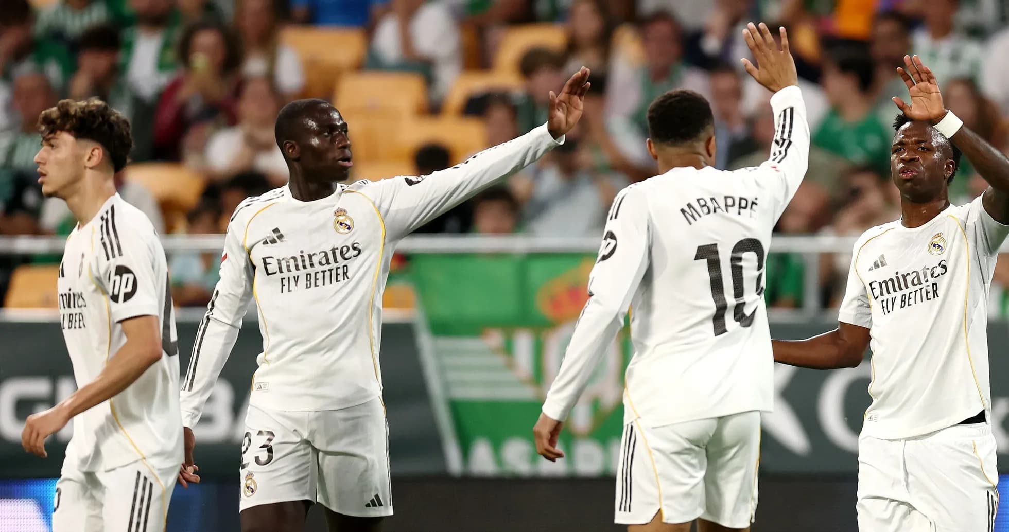 Real Madrid players celebrating a goal on the field