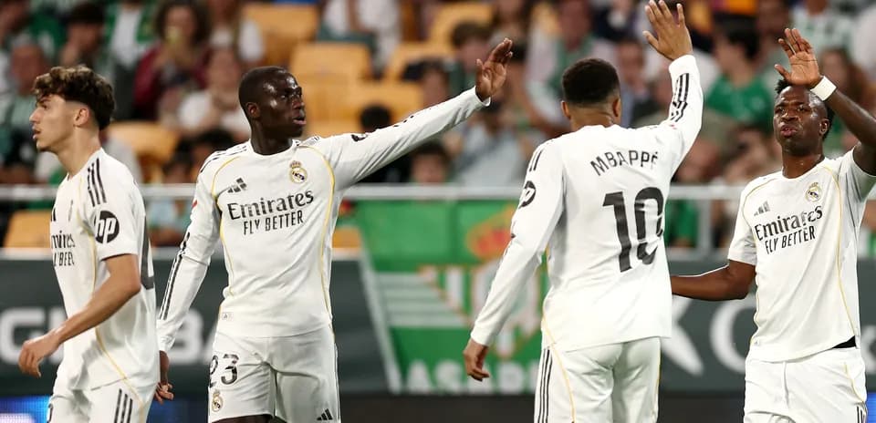 Real Madrid players celebrating a goal on the field
