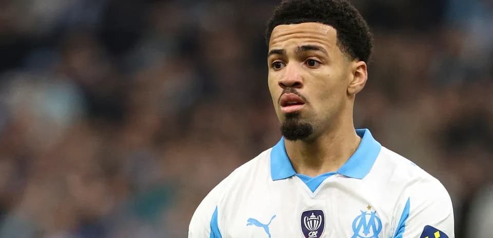 Player wearing Marseille kit on the pitch