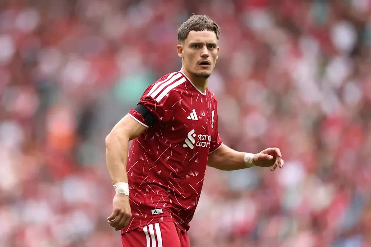 Player in red jersey during football match