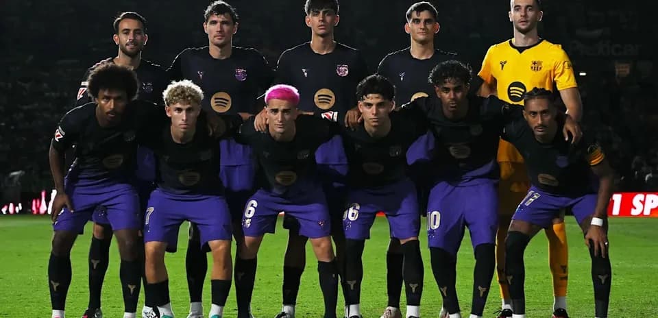 Football team posing for group photo before match