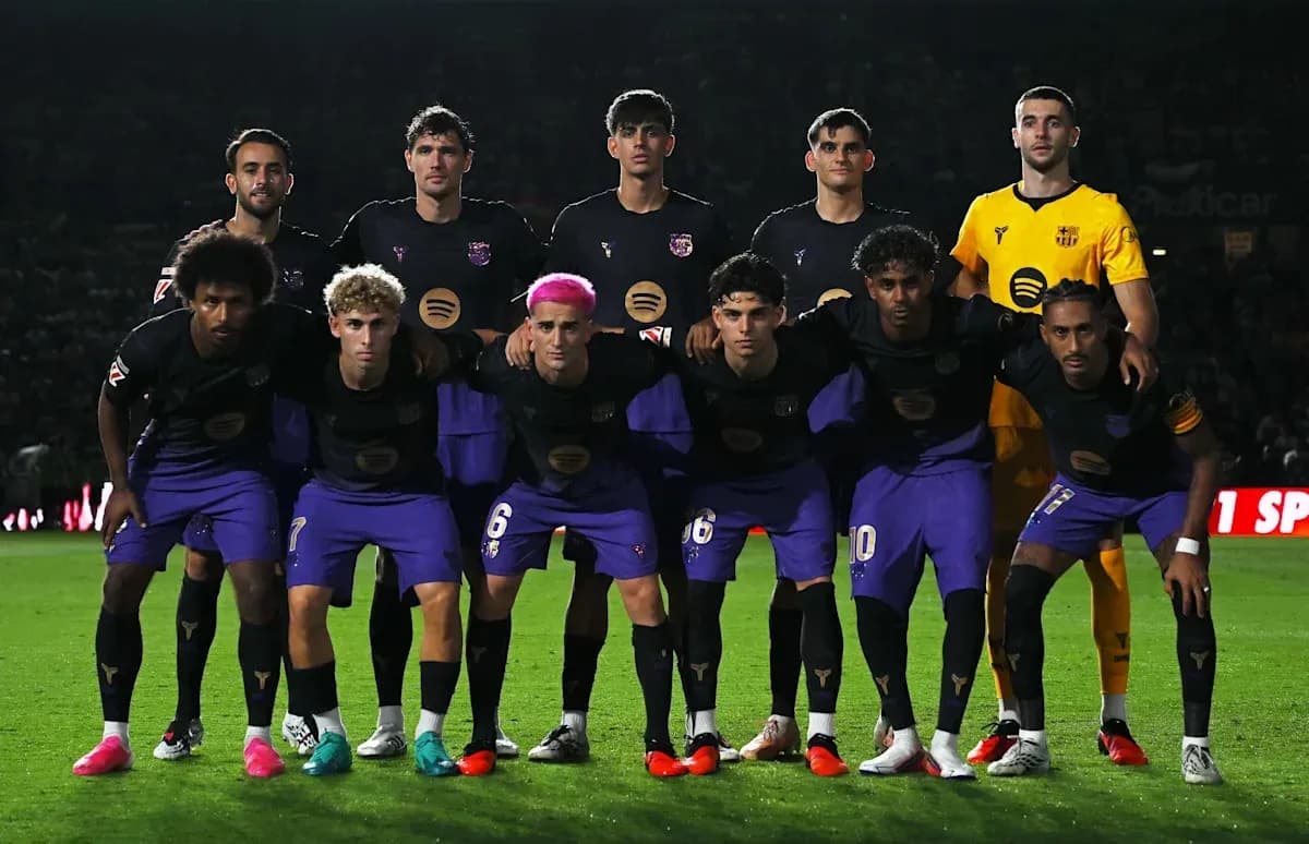 Football team posing for group photo before match