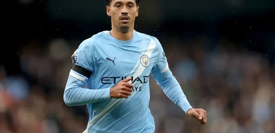 Player running on the pitch in light blue kit