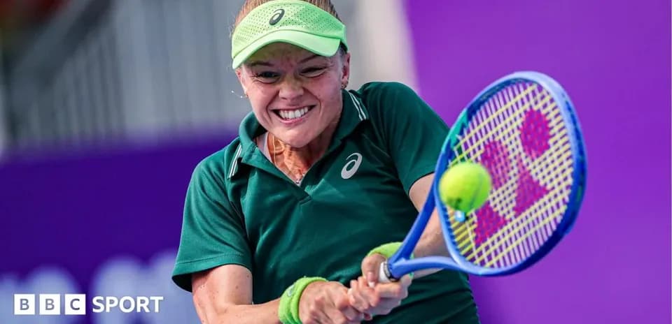 Tennis player hitting a ball during a match
