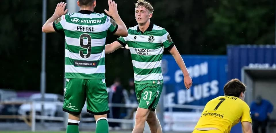Players celebrating a goal during a match