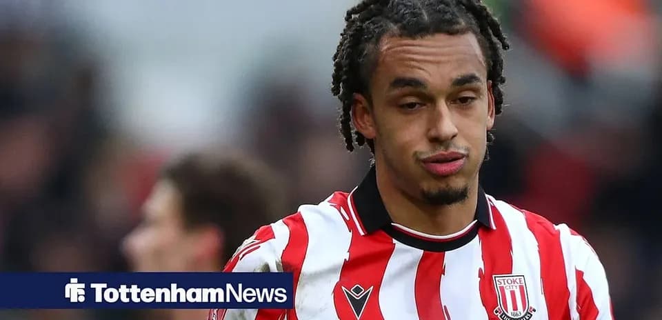 Stoke City player in red and white striped jersey