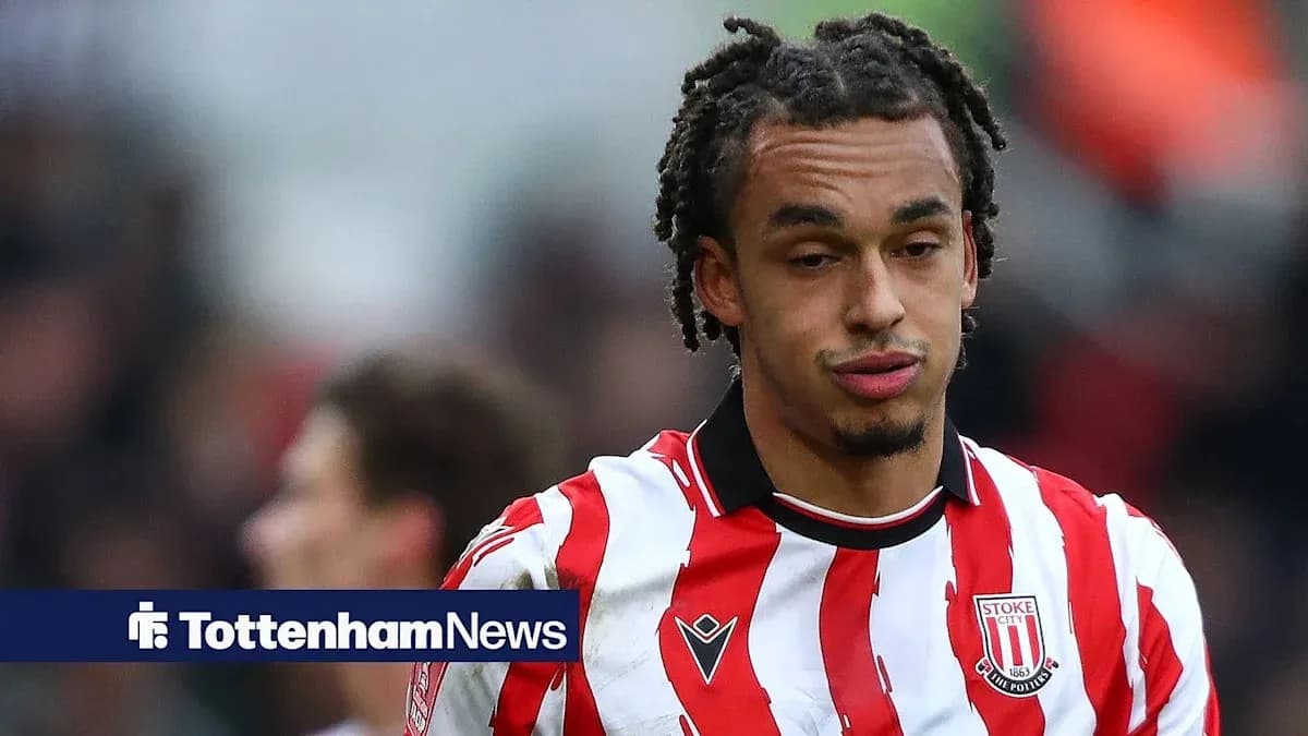 Stoke City player in red and white striped jersey
