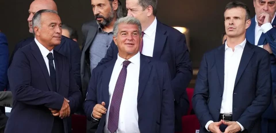 Executives watching a match from VIP box