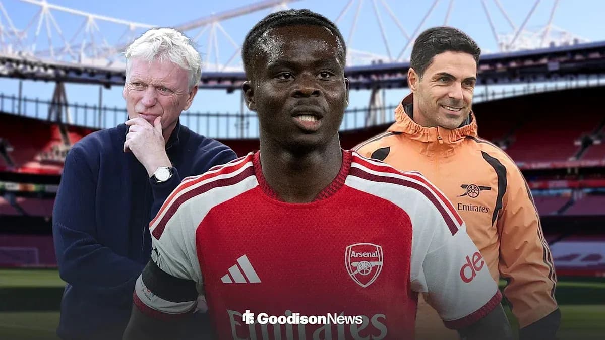 Football managers and player in Arsenal kit at stadium