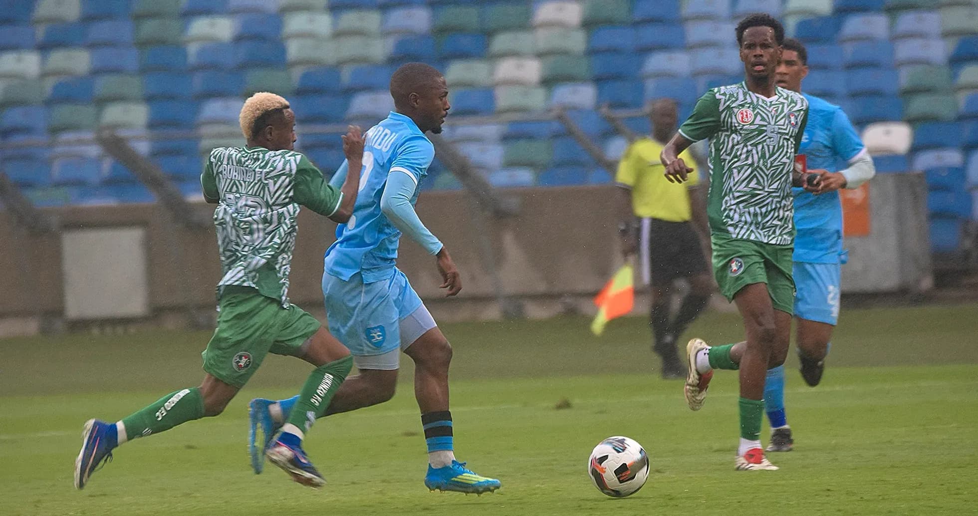 Players competing for the ball in CAF Confederation Cup