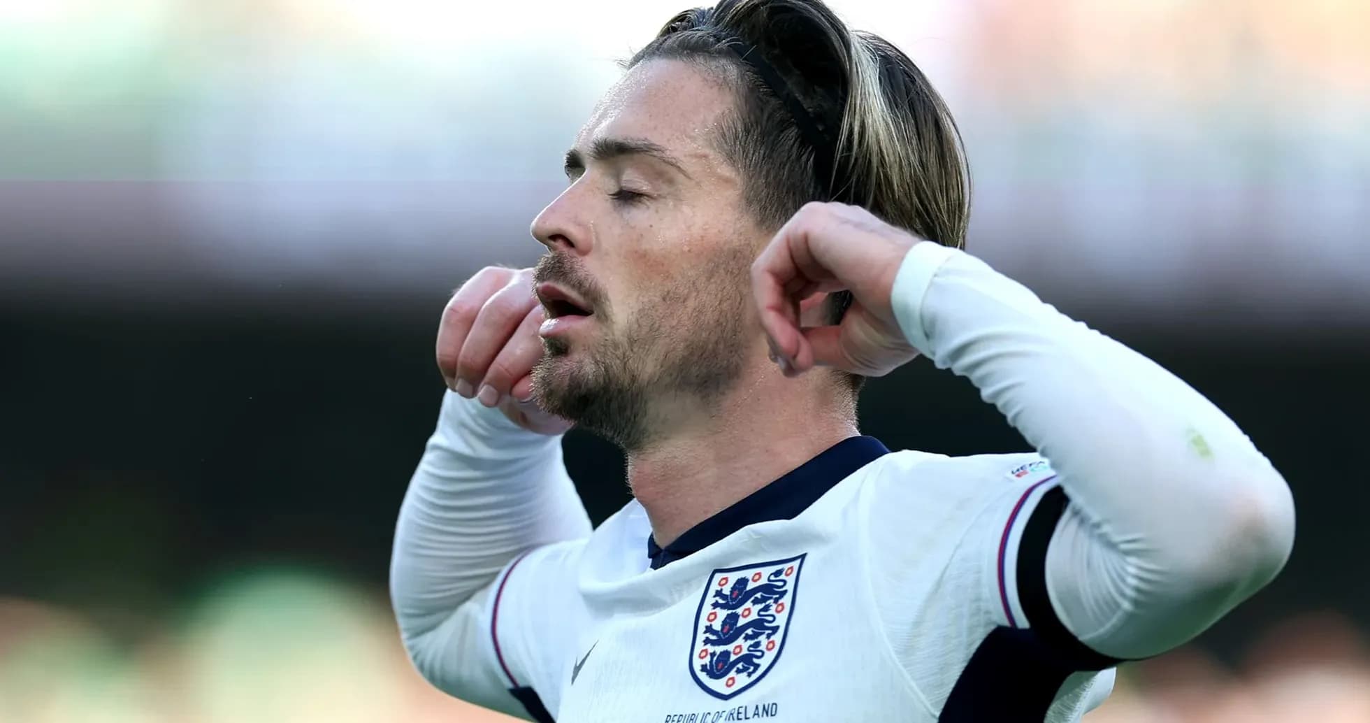 Player with England jersey during match action