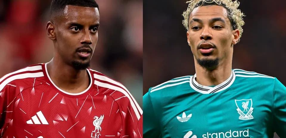 Two Liverpool players in home and away kits