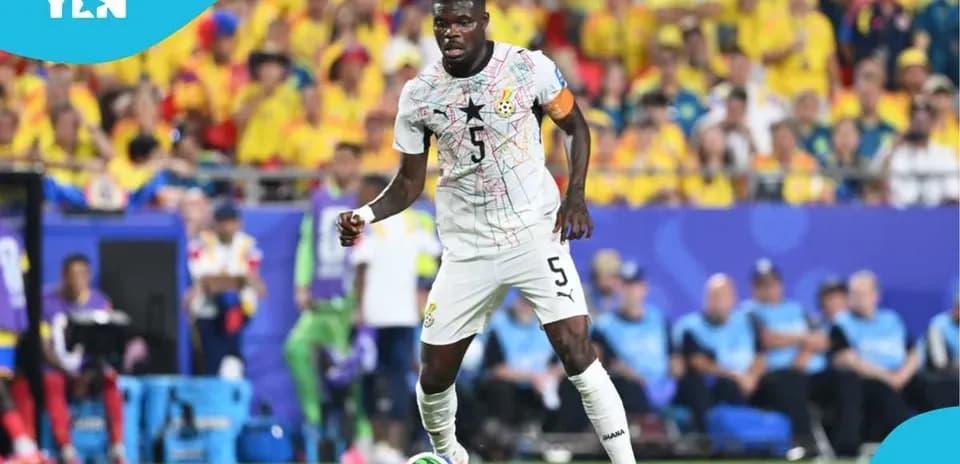 Ghana player dribbling the ball during match