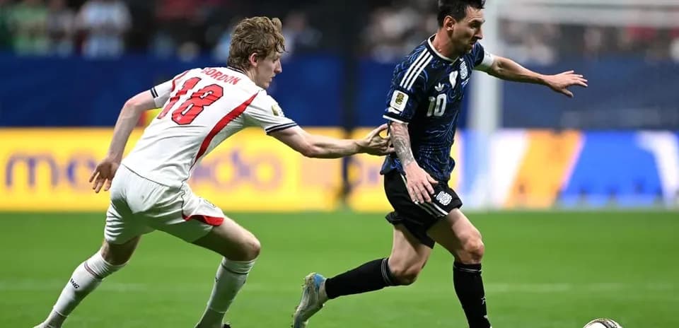 Player evading tackle while dribbling ball