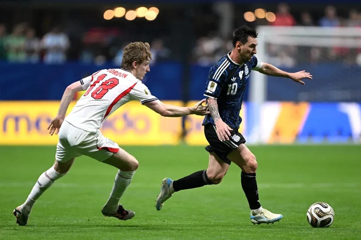 Player evading tackle while dribbling ball