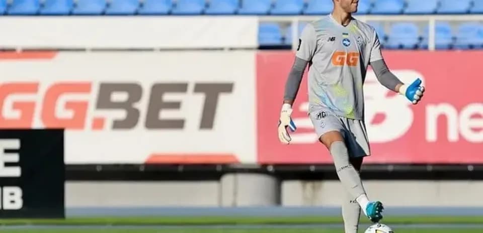Goalkeeper preparing to kick ball during training