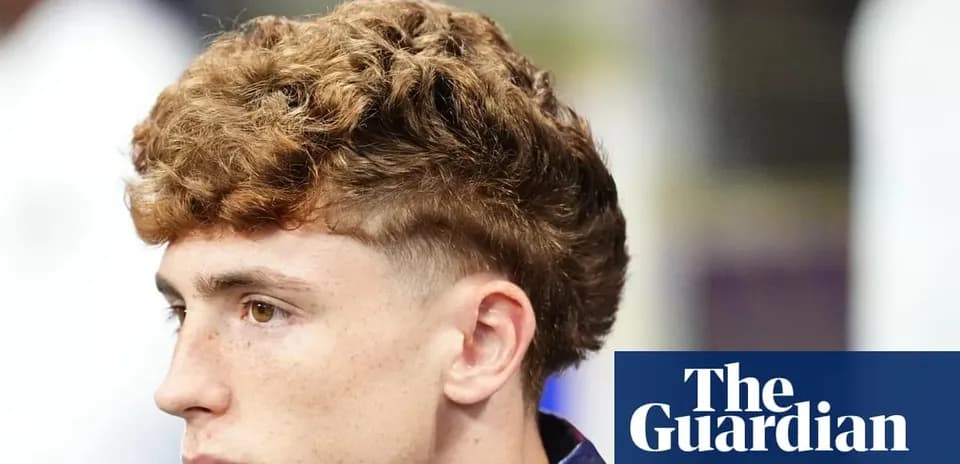 Profile of young man with curly hair