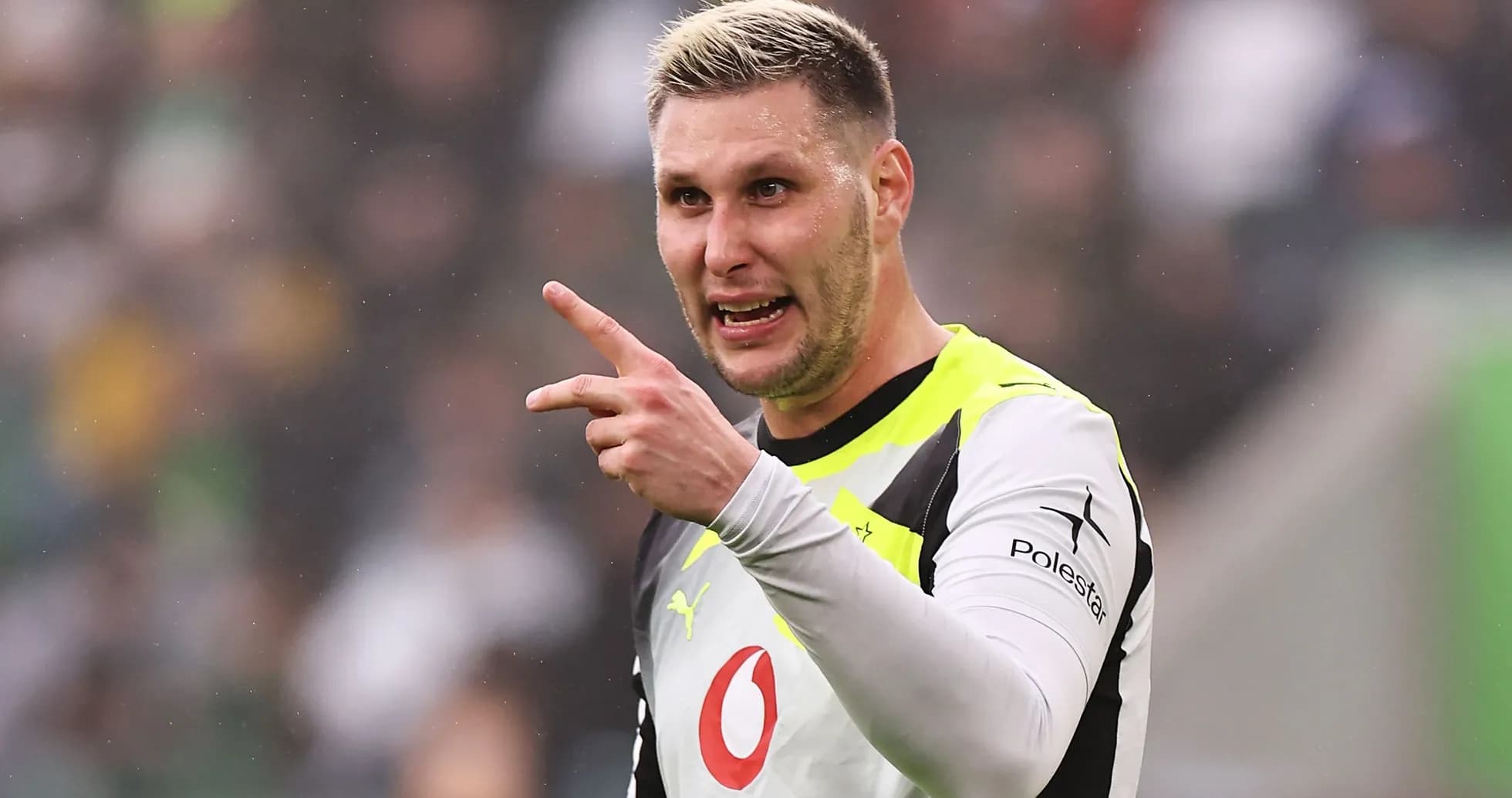 Goalkeeper gesturing during a football match