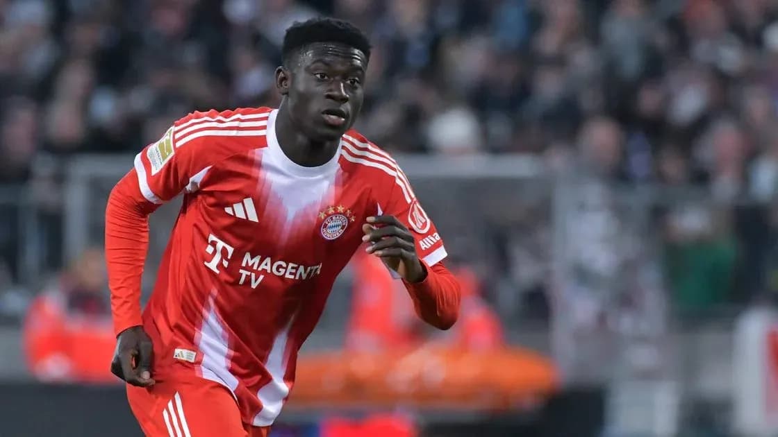 Player in Bayern Munich kit running on the field