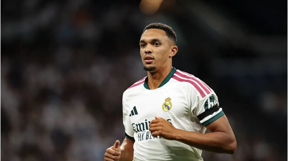 Player in Real Madrid jersey running on field